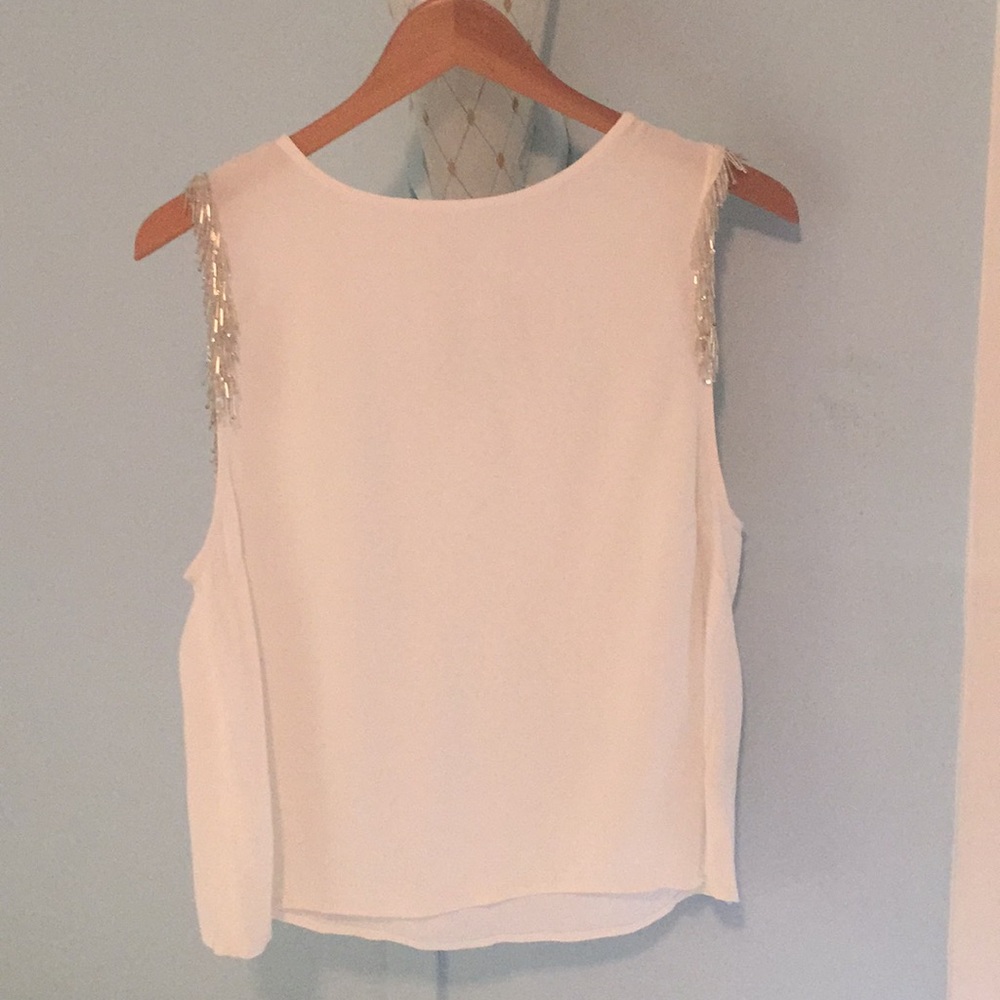 White top with beaded fringe